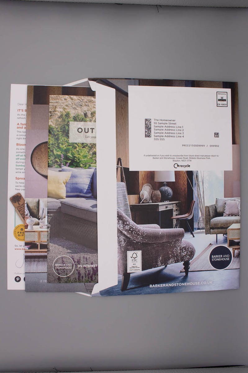 An addressed envelope with brochure for Barker and Stonehouse 