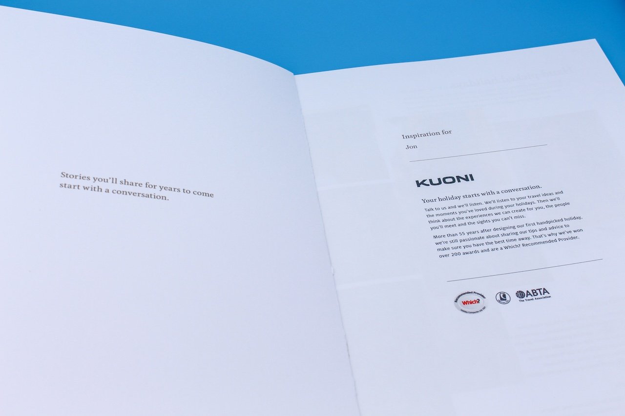 the opening page of a white travel brochure 