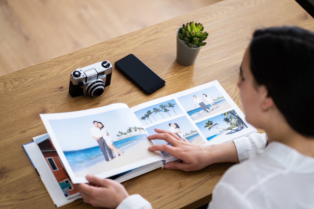 Woman browsing photo album